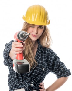 Frau mit Bohrmaschine Stockfoto    
